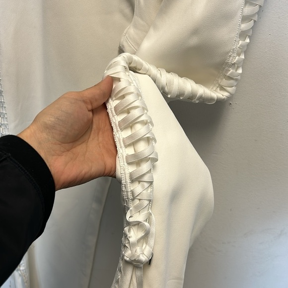 JONATHAN SIMKHAI Lace-up Cropped Crepe Flared Pants In Ivory - Picture 6 of 9